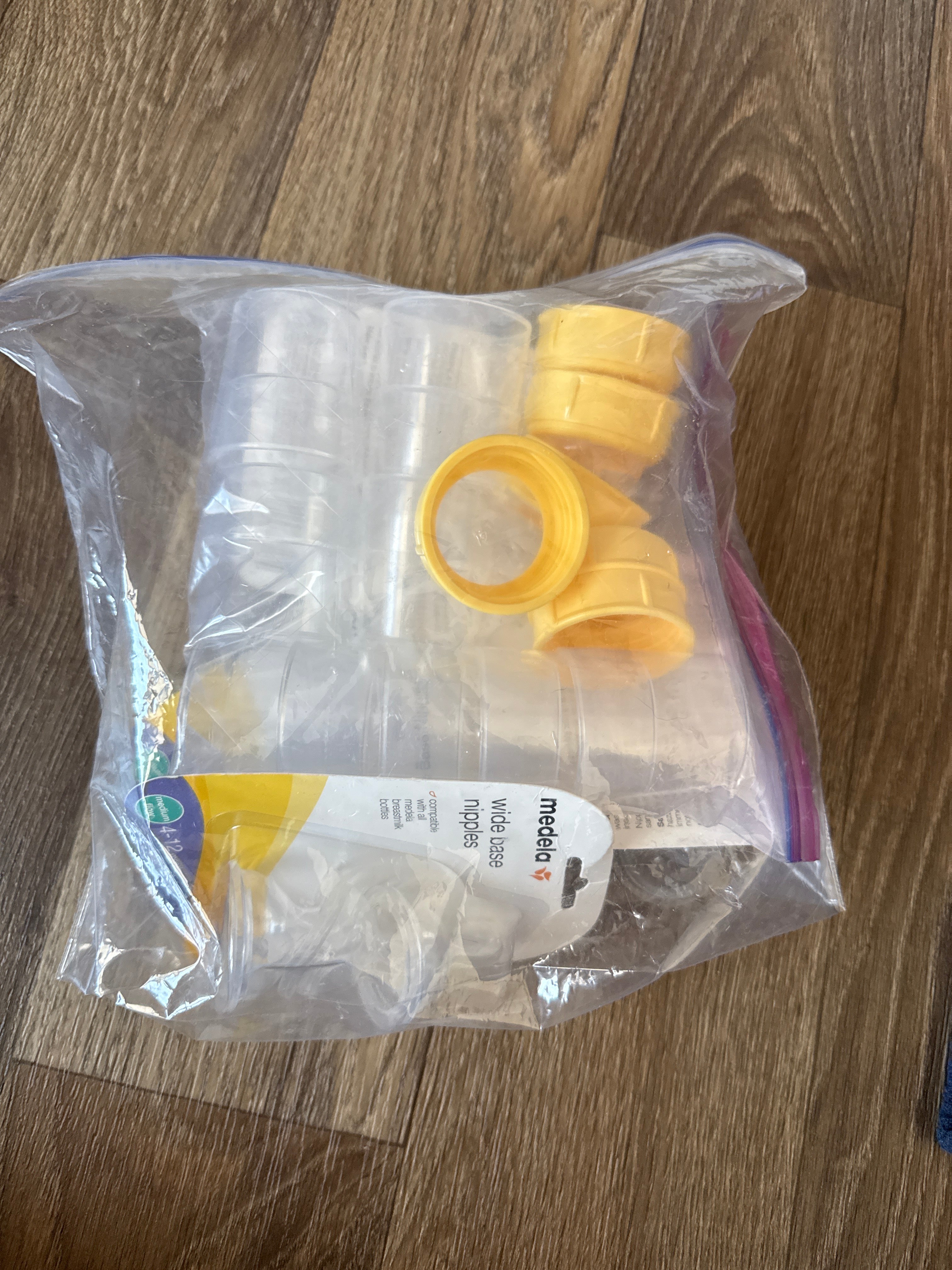 Medela bottle nipples, caps, and rings