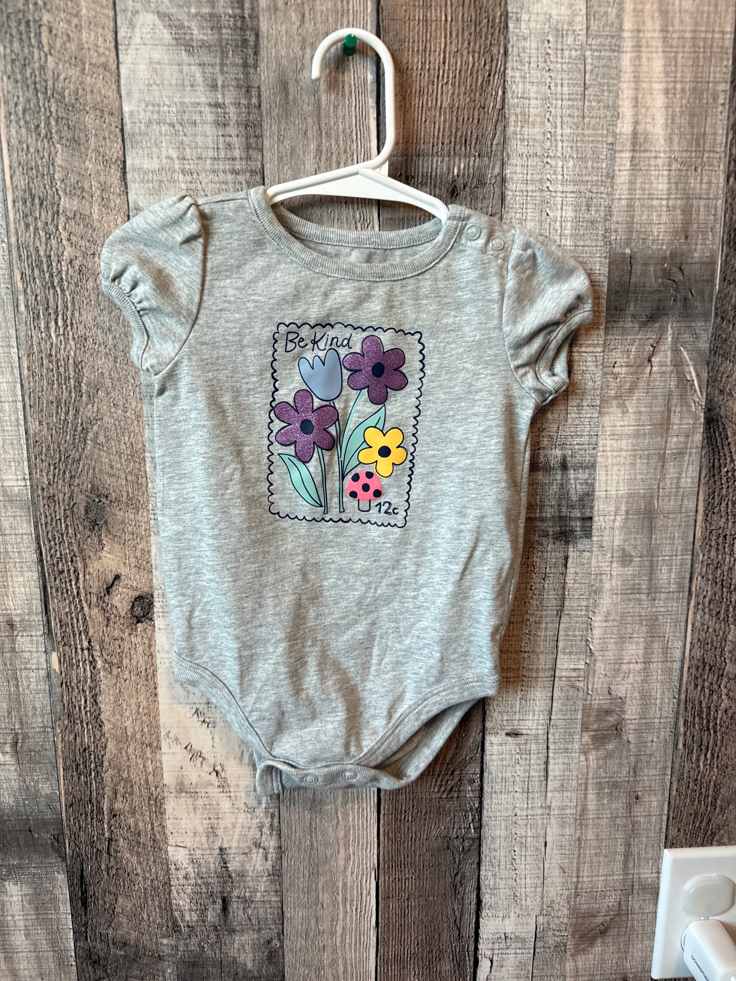 6-9 month onesie