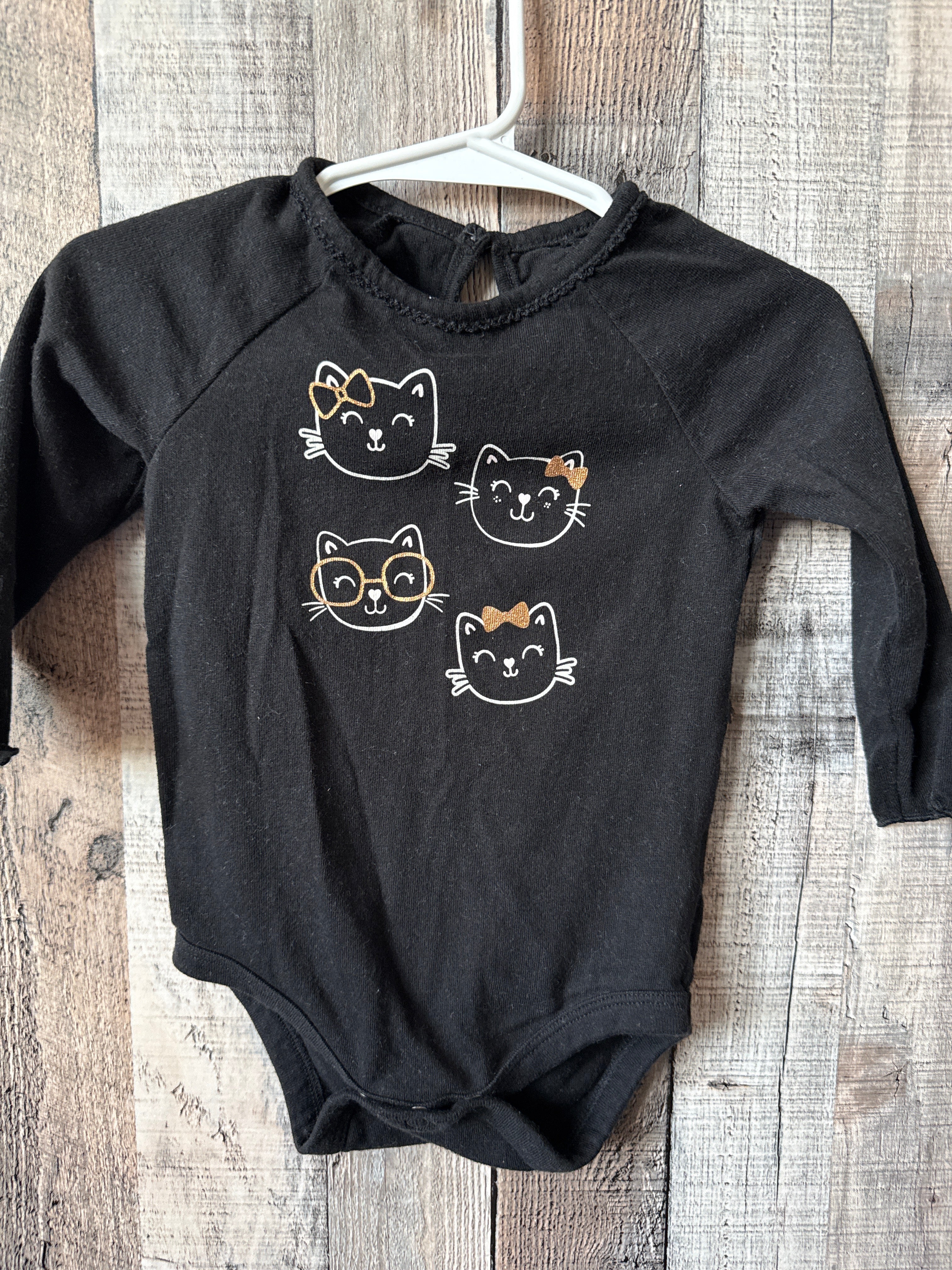 6-9 month onesie