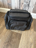 Breast milk cooler bag with pockets for pump