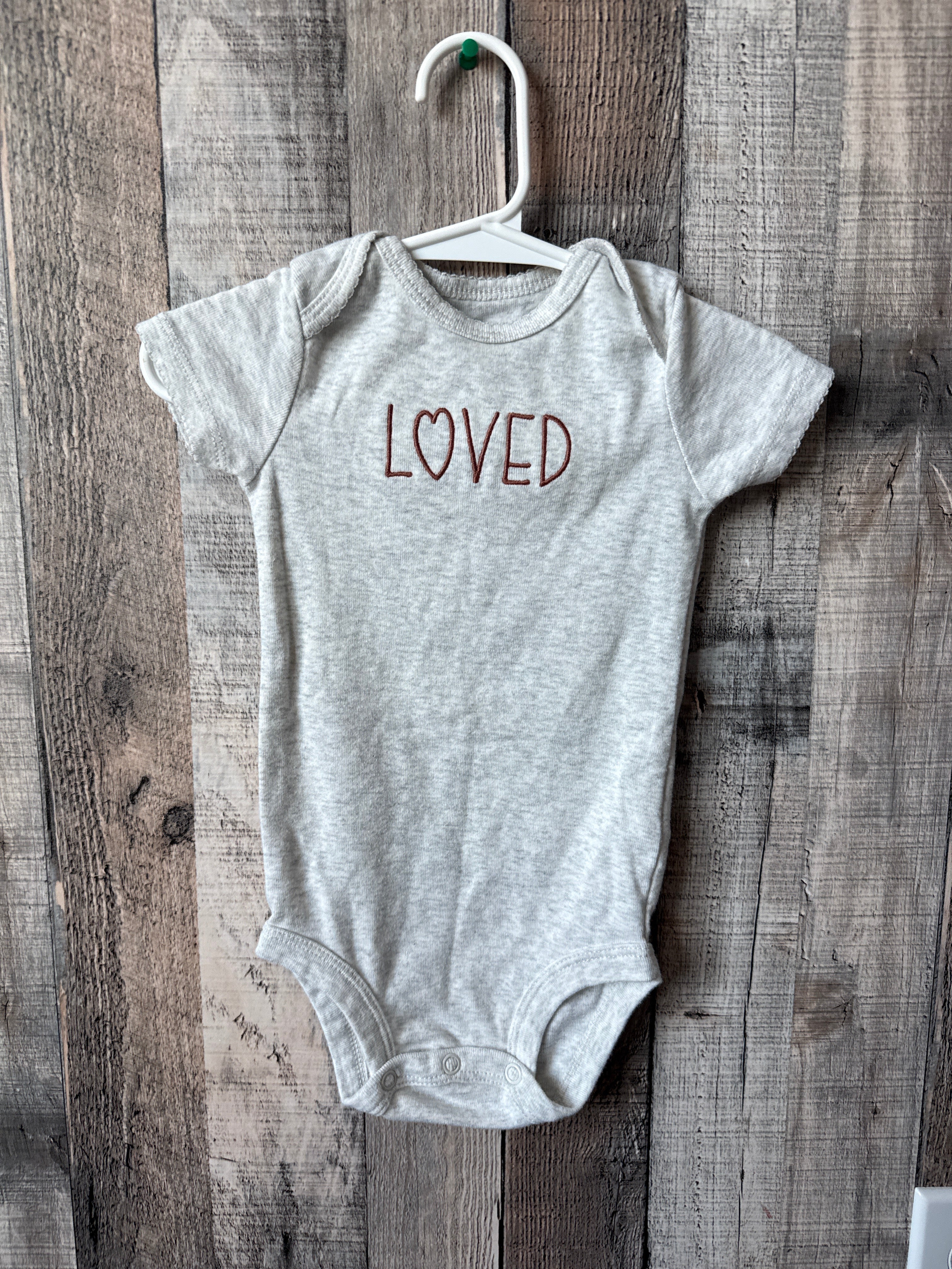 6-9 month onesie
